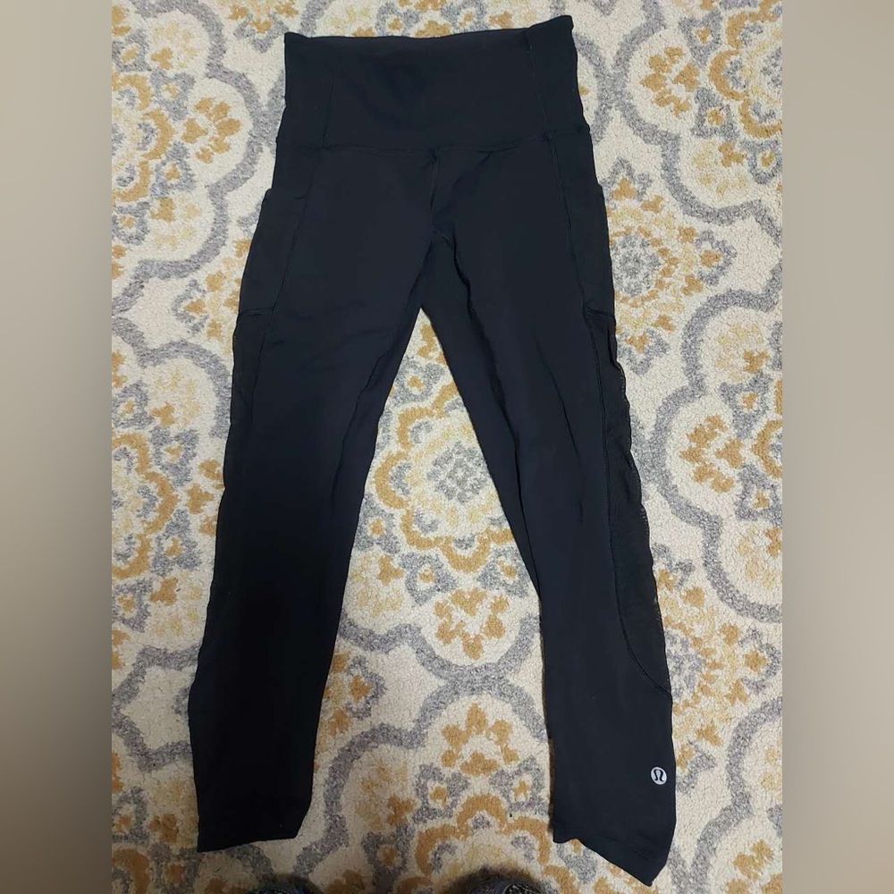 Lululemon black cropped leggings with mesh inserts